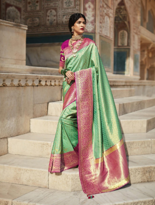 Alluring Green And Purple Premium Febric With Embroidery Or Swrovski Work Saree