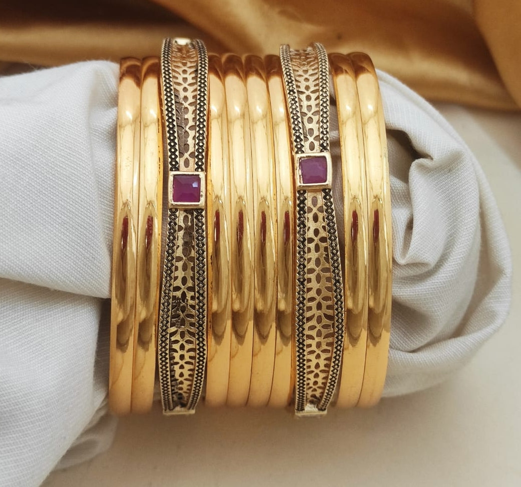 Elegante Stone Studded Bangles Often Found Gold Plated Indian Jewelry Set