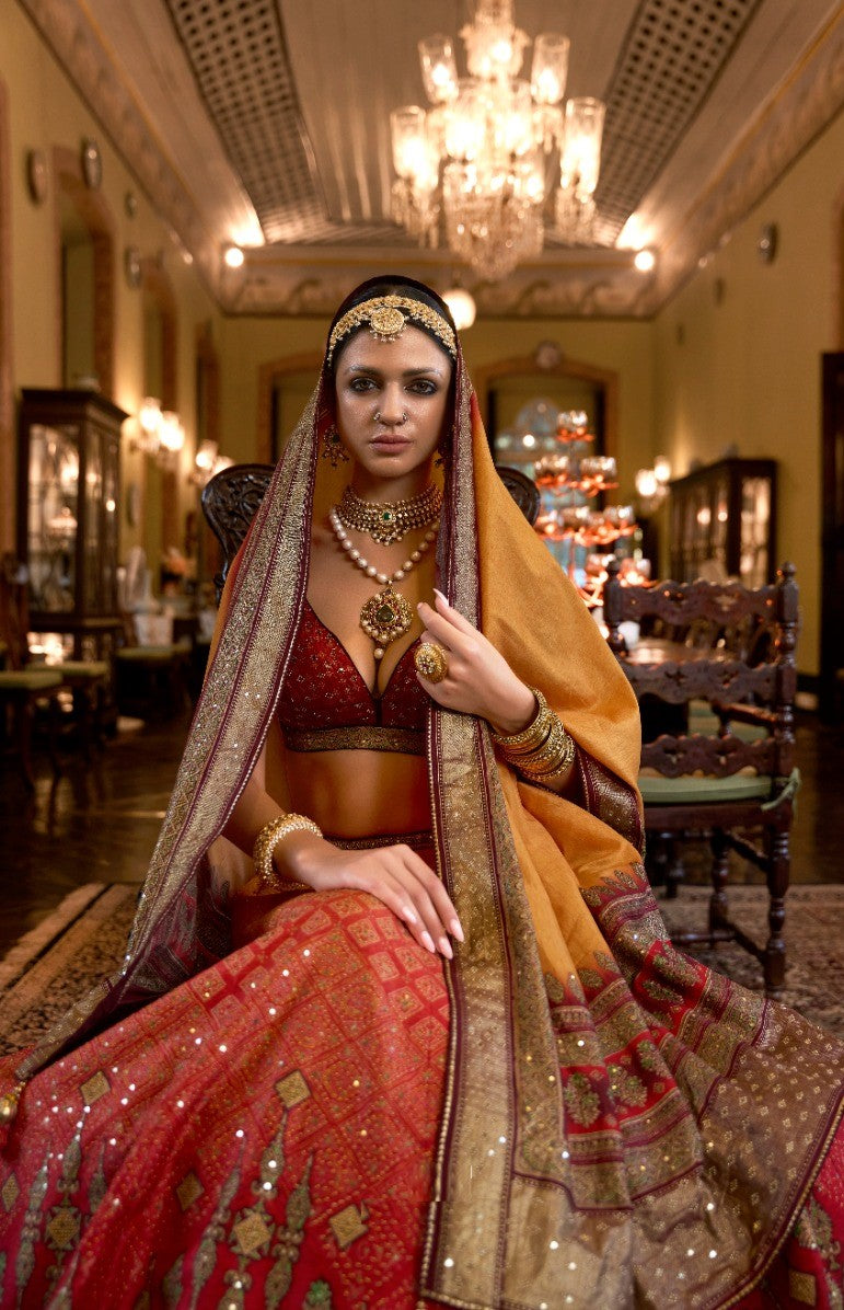 Classy Red And Orange Rajwadi Silk Bridal Lehenga With Mirror Work