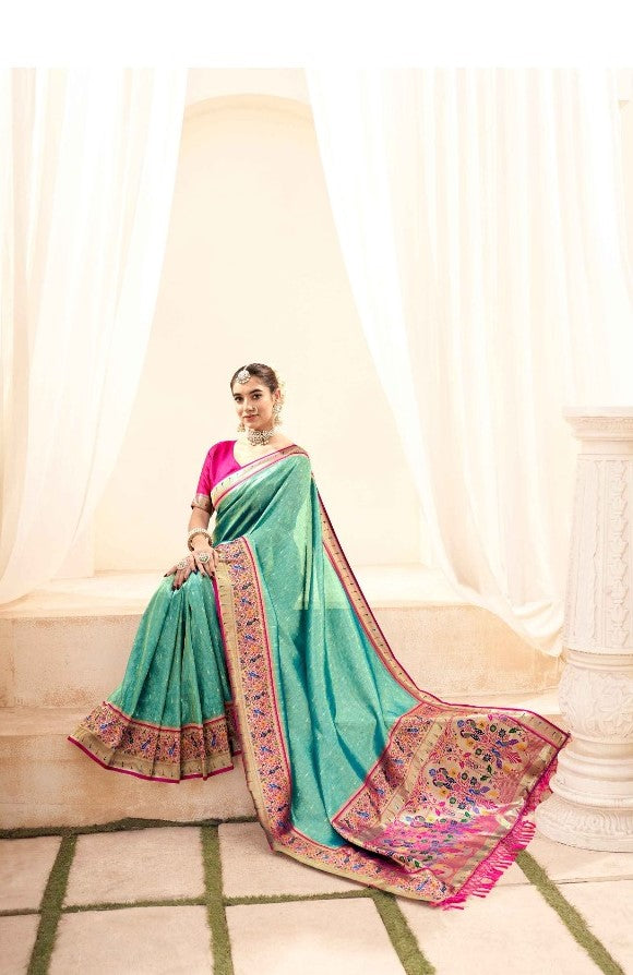 Statement-Making Teal And Pink Paithani Silk Saree With Zari Border
