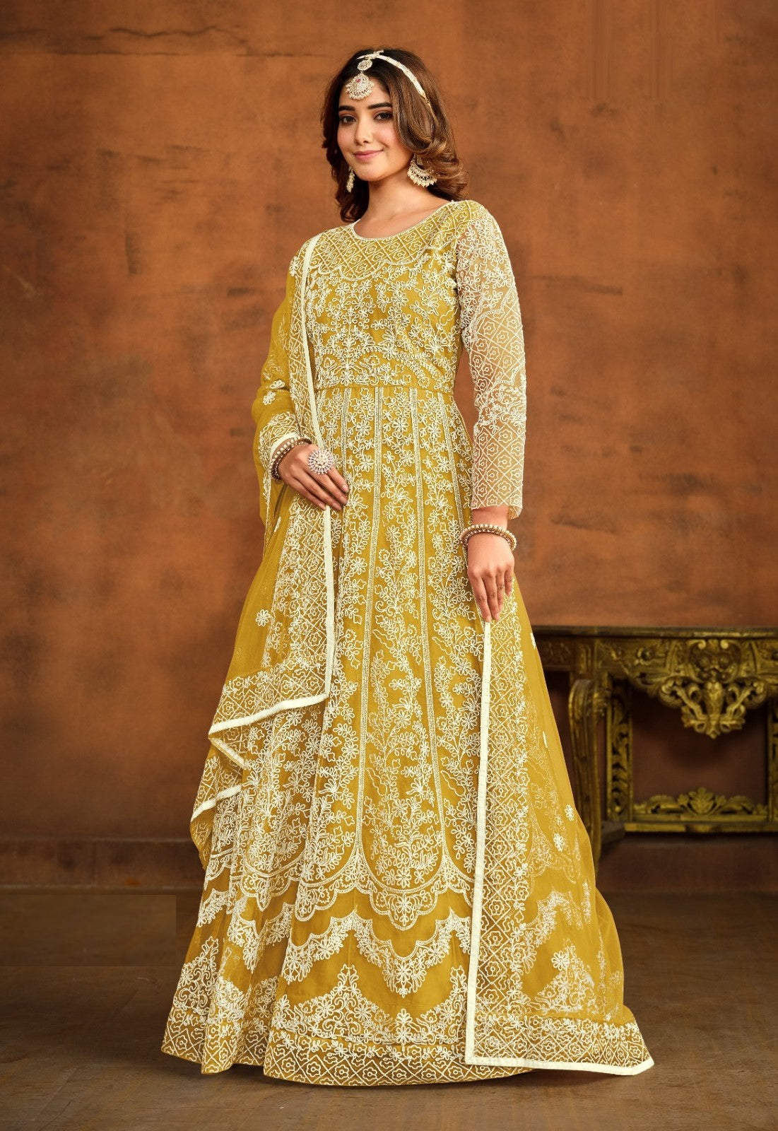 Stylish Mustard Net Floor Length Suit Set With Embroidery Work