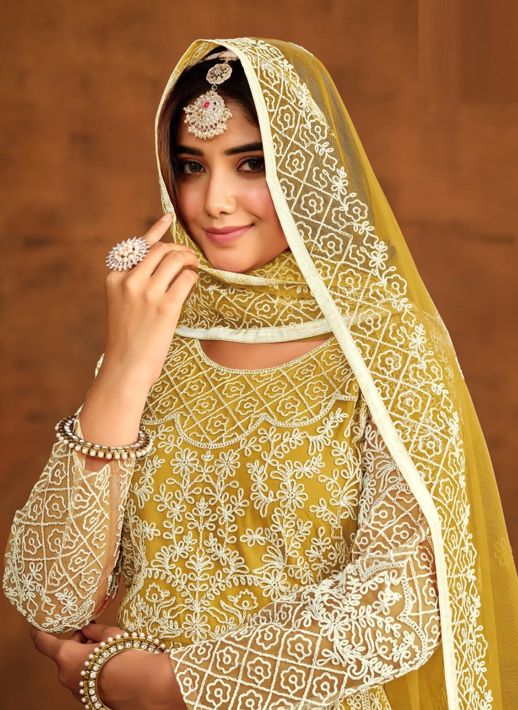 Stylish Mustard Net Floor Length Suit Set With Embroidery Work
