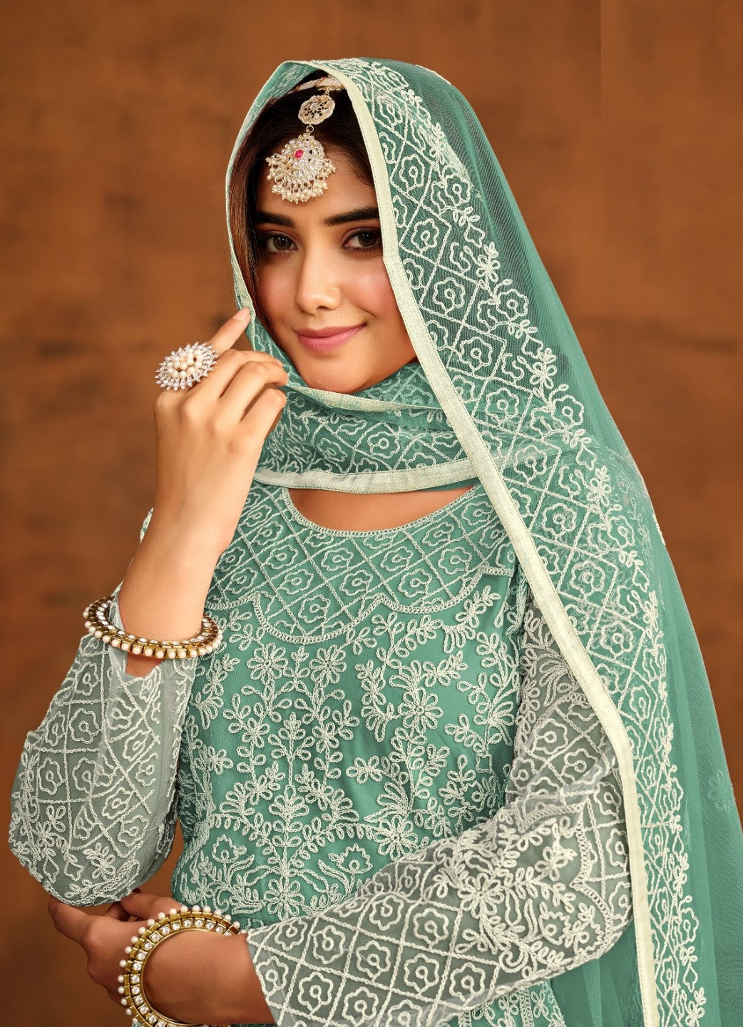 Glamorous Sea Green Net Floor Length Suit Set With Embroidery Work