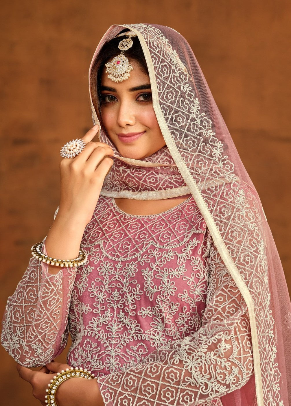 Flawless Light Pink Net Floor Length Suit Set With Embroidery Work