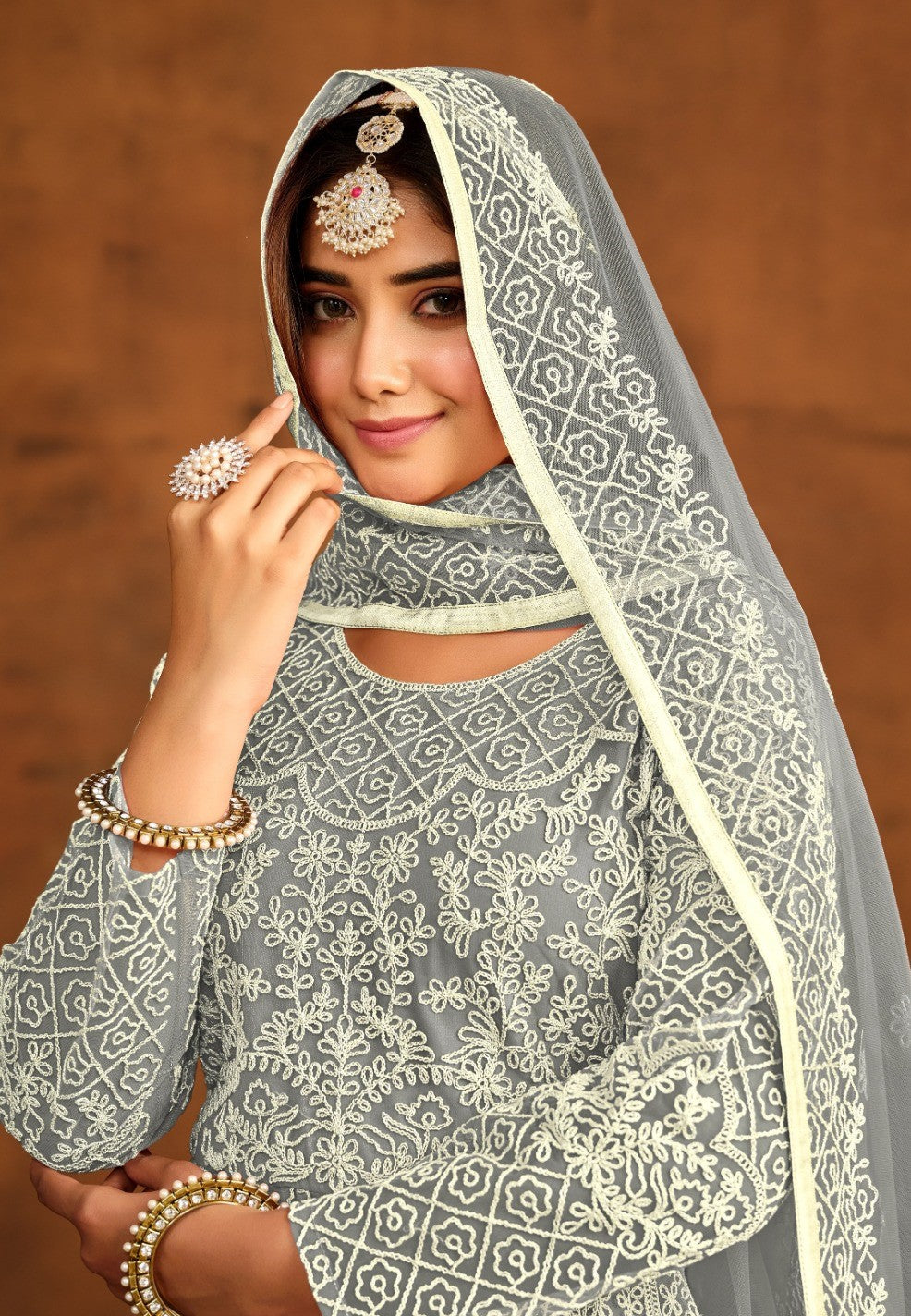 Dazzling Grey Net Floor Length Suit Set With Embroidery Work