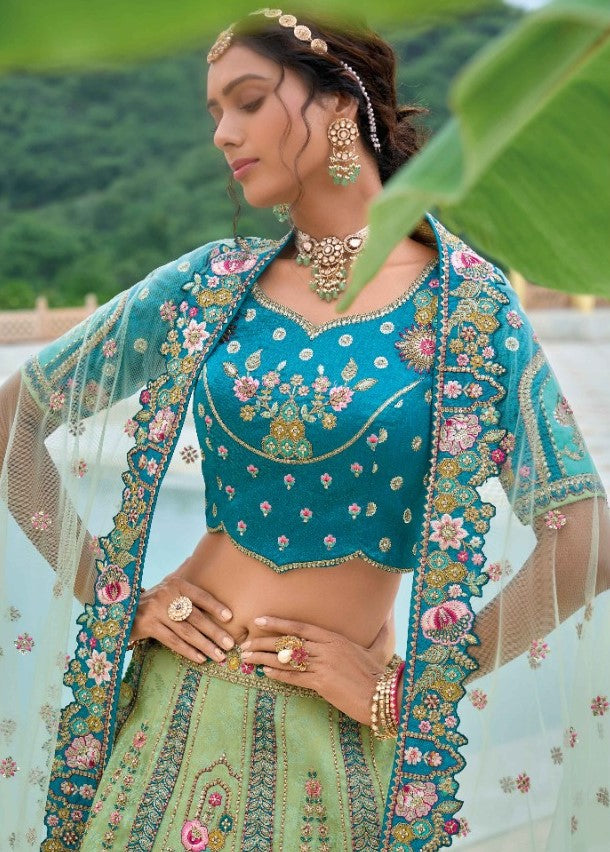 Captivating Sea Green And Teal Silk Bridal Lehenga With Embroidery Work