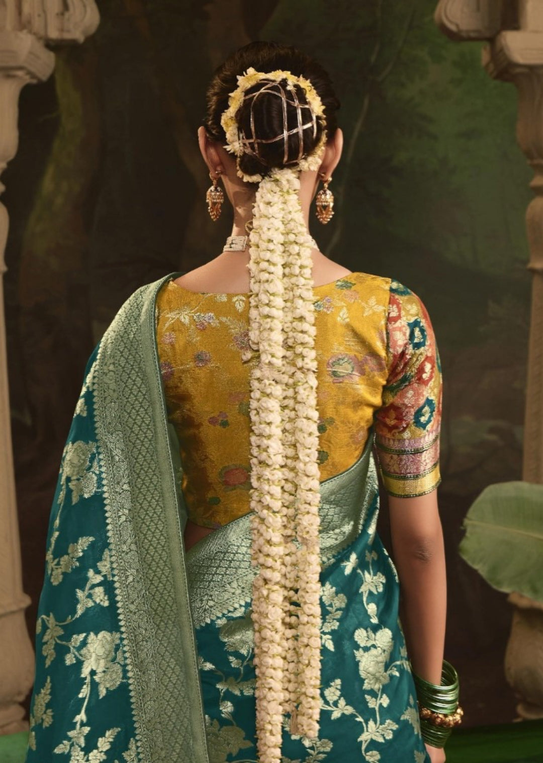 Immaculate Teal Crepe Dola Silk Saree