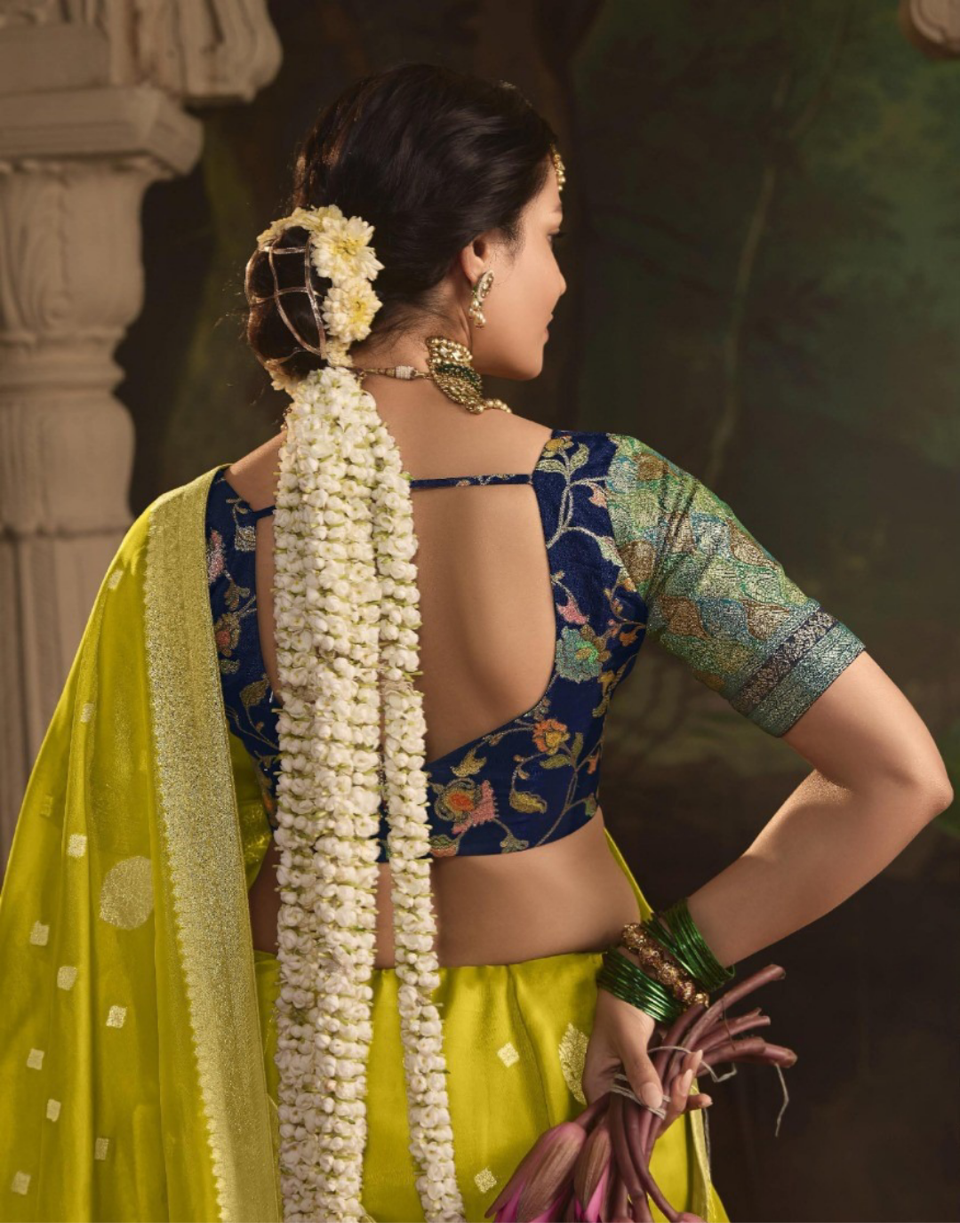 Sculpted Green Crepe Dola Silk Saree