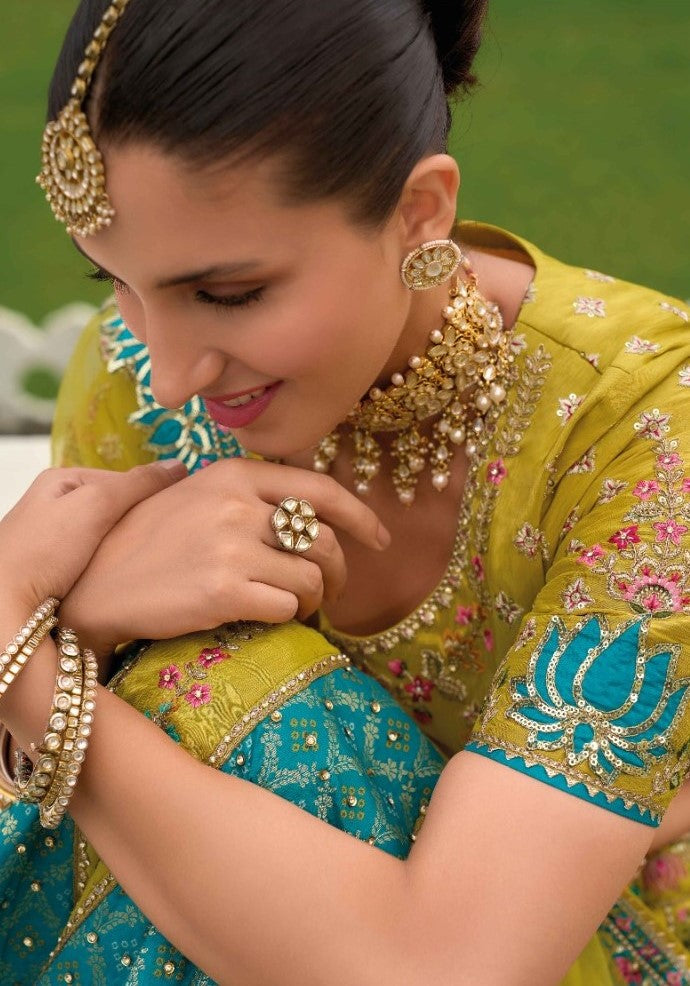 Women Yellow And Blue Silk Bridal Lehenga With Embroidery Work
