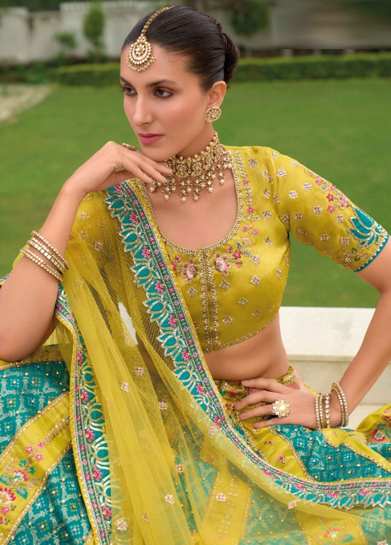 Women Yellow And Blue Silk Bridal Lehenga With Embroidery Work