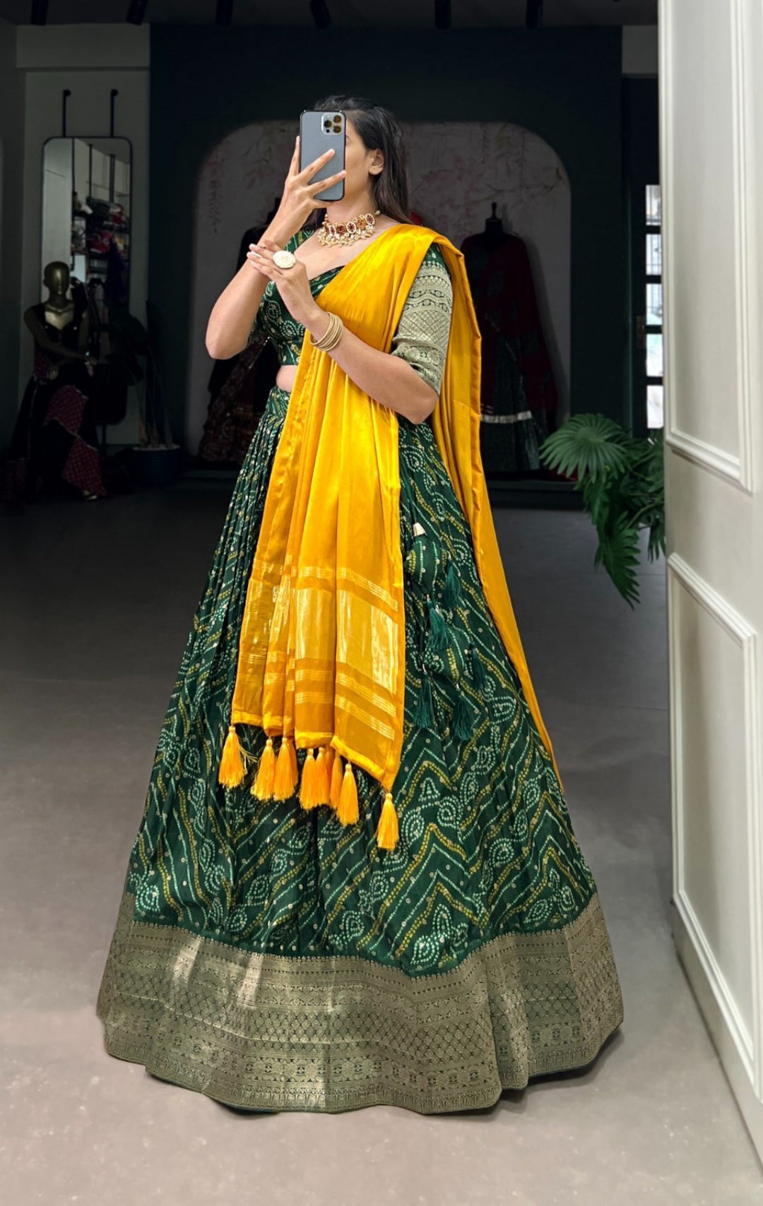 Sculpted Green Viscose Dola Silk With Zari Weaving Printed Bandhani Lehenga