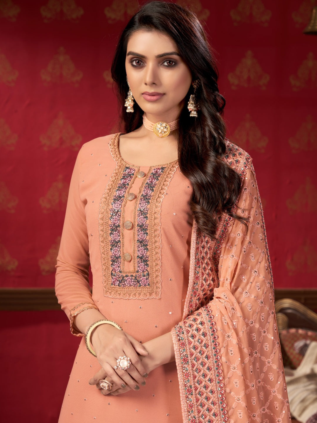 Flattering Peach Faux Georgette Gharara Bottom Suit Set