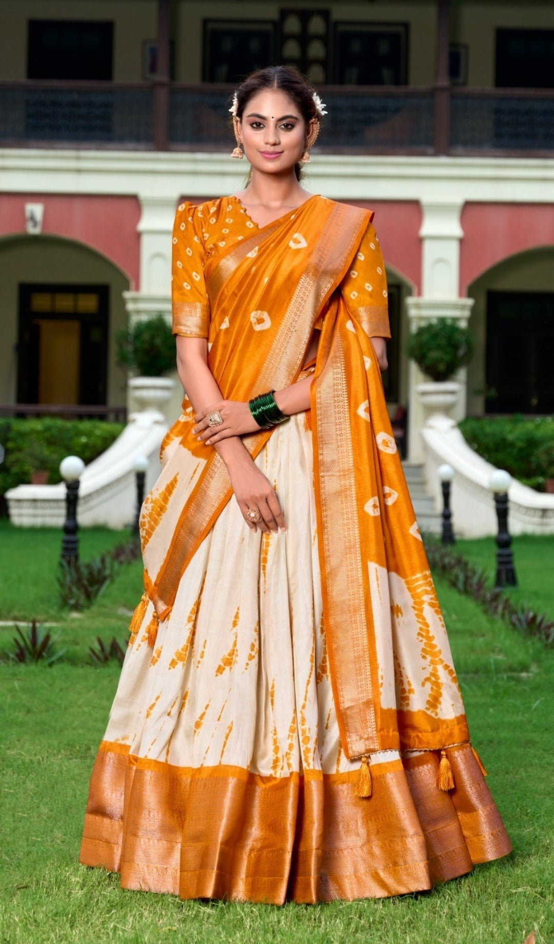 Vibrant Cream And Rust Dola Silk Shibori Print With Zari Weaving Border Traditional Lehenga