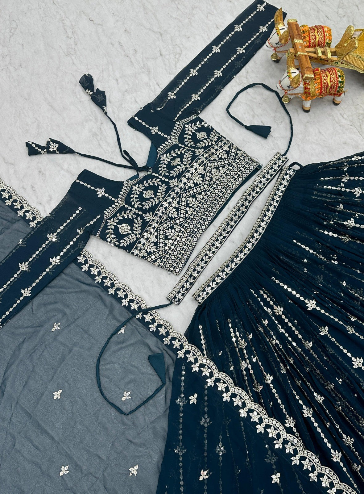 Opulent Navy Blue Georgette Gliterring Lehenga With Embroidery Sequins Work