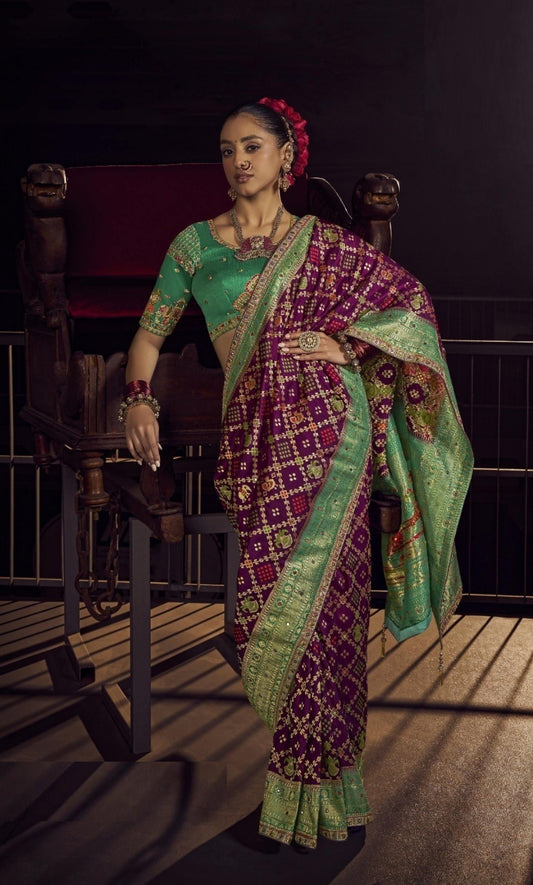 Stunnig Purple And Sea Green Viscose Dola Silk With Handwork Embroidery Saree