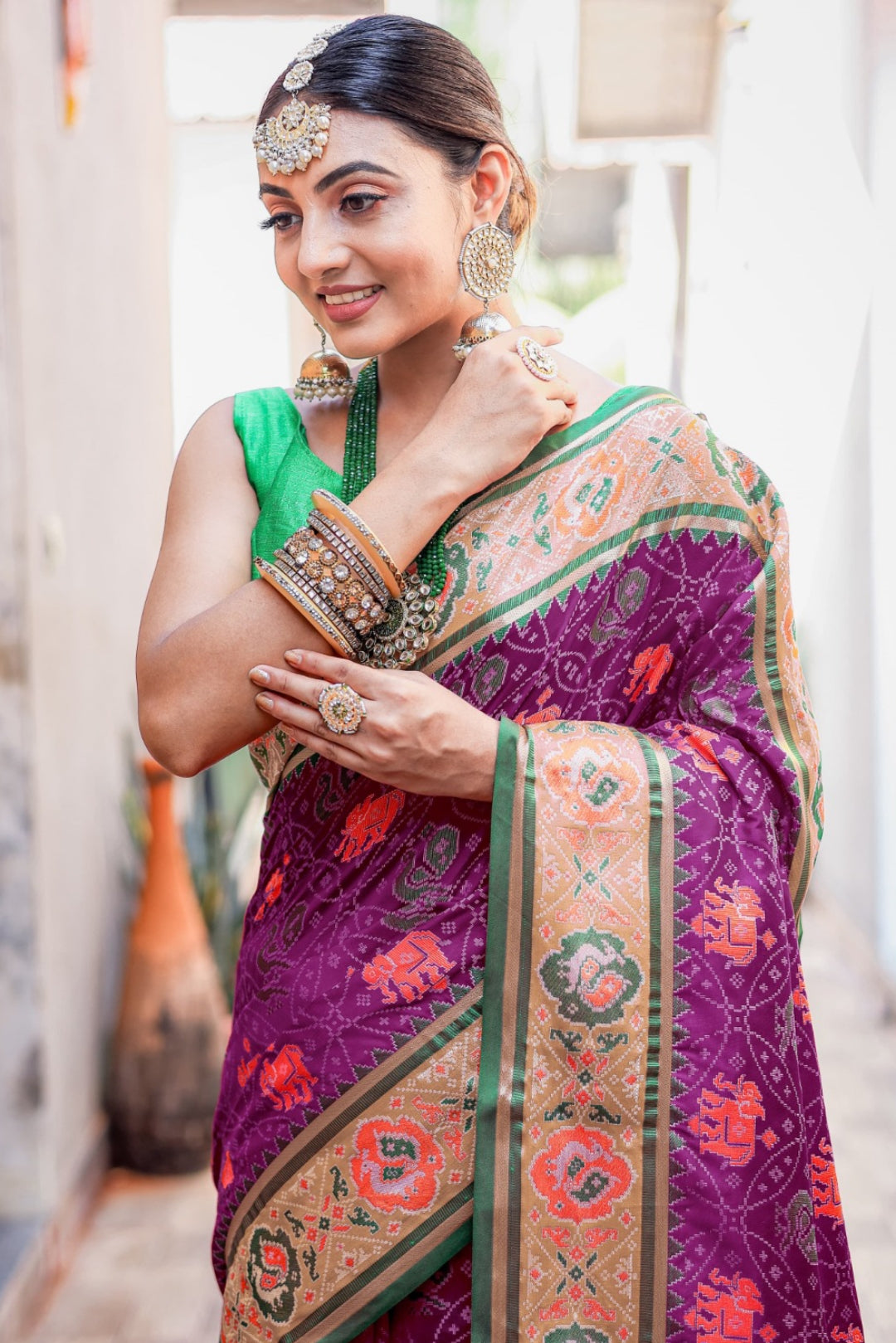 Women Purple And Green Patola Silk Saree