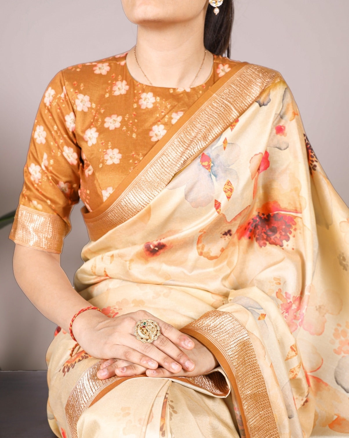 Dazzling Beige And Orange Tussar Silk Floral Print Saree