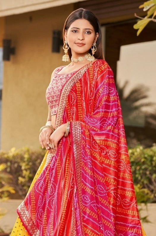 Dazzling Mustard And Pink Art Silk Glittering Shining Lehengas