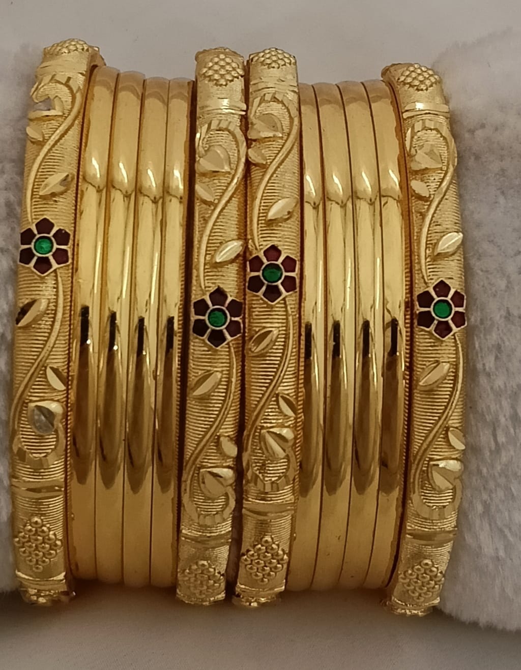 Awristocrat Indian Gold Plated Metal Bangles Featuring Textured And Studded Patterns