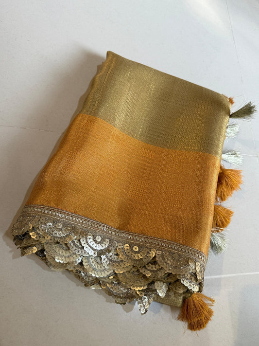 Gleaming Gold And Orange Banarasi Zari Tanchui Kanchipuram Soft Silk Saree