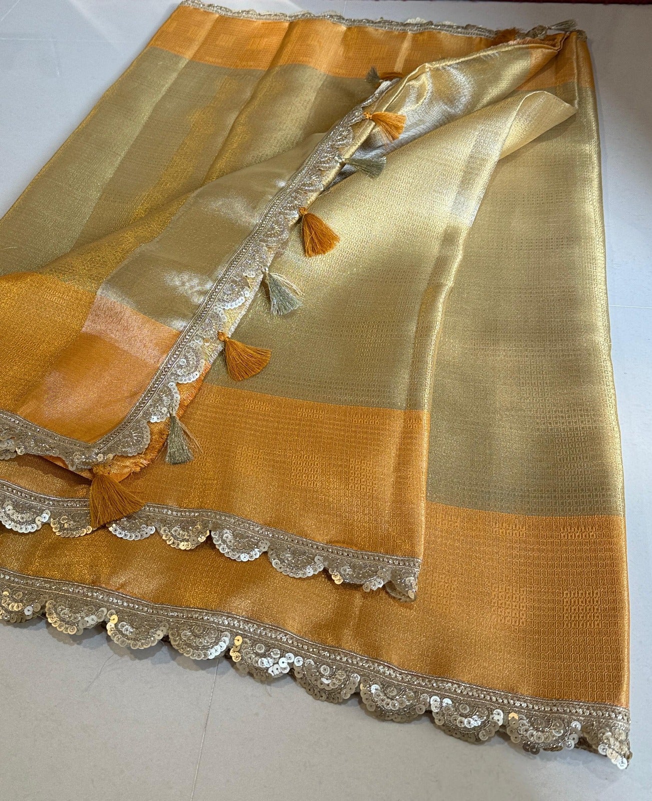 Gleaming Gold And Orange Banarasi Zari Tanchui Kanchipuram Soft Silk Saree