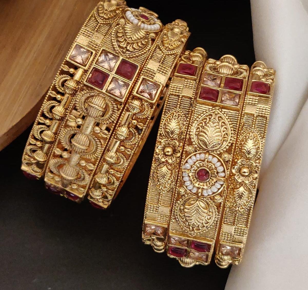 Indulge Gold Plated Brass Bangle Set Featuring Intricate Featuring And Studded Stones