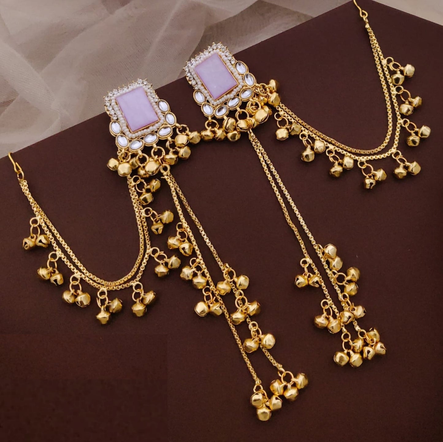 Kashmiri Style Earrings Featuring A Square Light Pink Stone Studded With Kundan And Pearl Accents