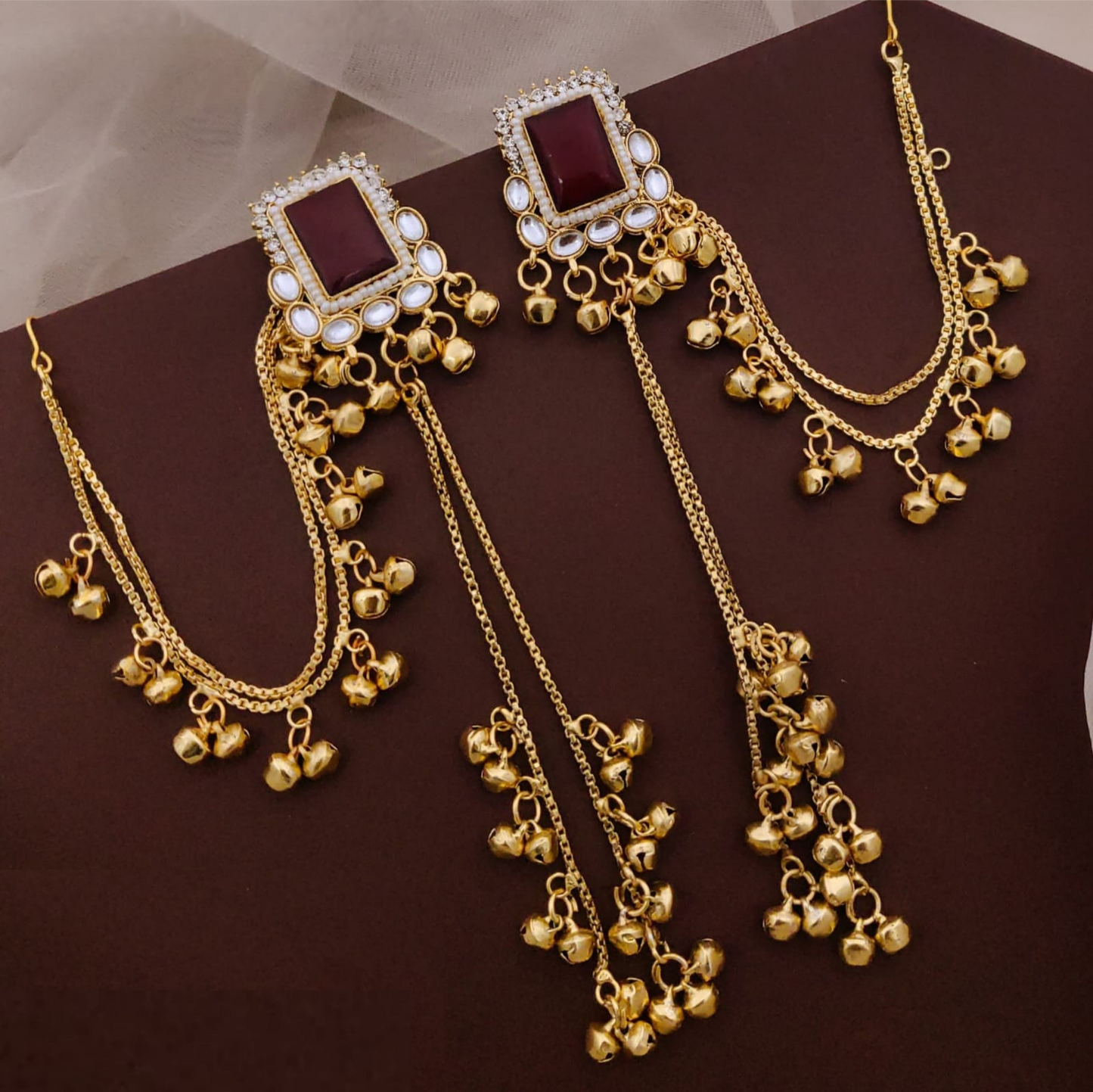 Kashmiri Style Earrings Featuring A Square Maroon Stone Studded With Kundan And Pearl Accents