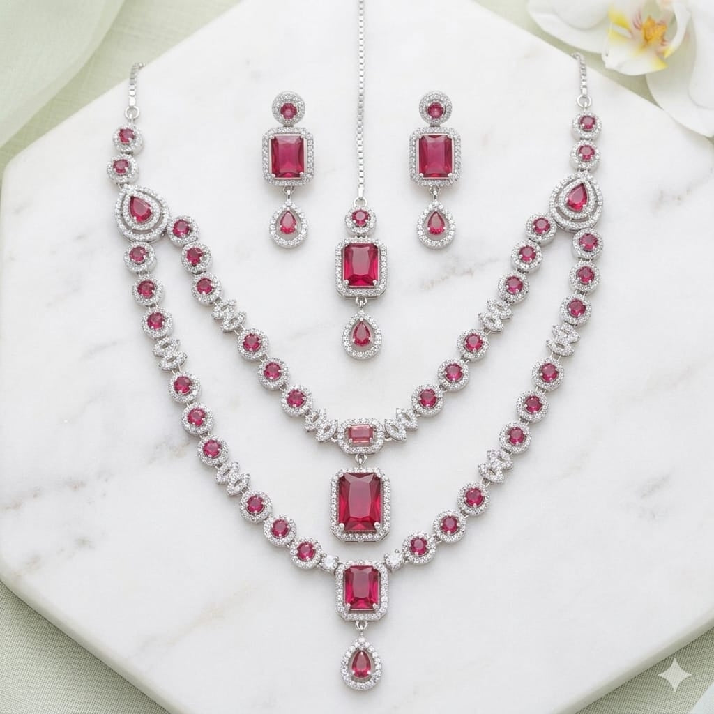 Silver Plated American Diamond Studded Jewelry Set Featuring Pink Stones And Matching Earrings