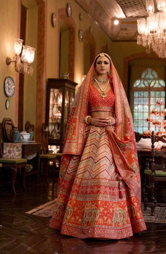 Classy Red And Orange Rajwadi Silk Bridal Lehenga With Mirror Work
