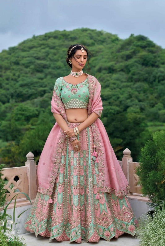 Magnificent Pink And Sea Green Silk Bridal Lehenga With Embroidery Work