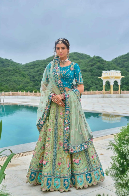 Captivating Sea Green And Teal Silk Bridal Lehenga With Embroidery Work
