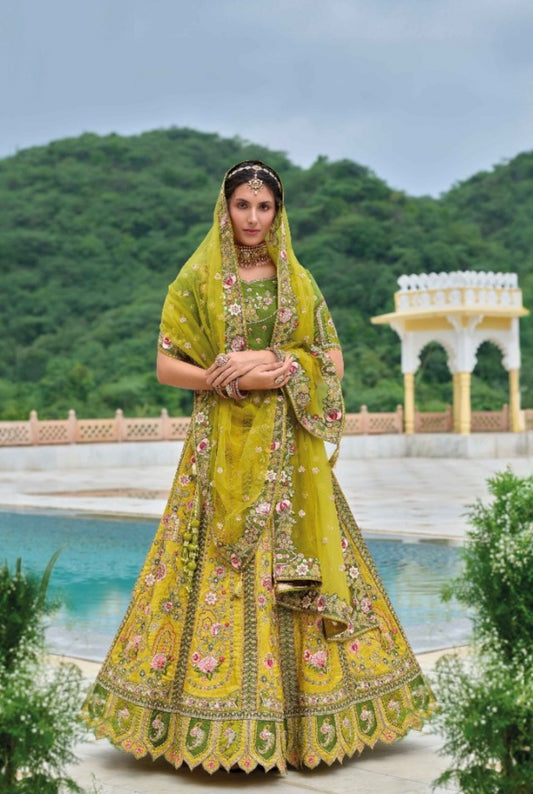 Lovely Yellow And Green Silk Bridal Lehenga With Embroidery Work