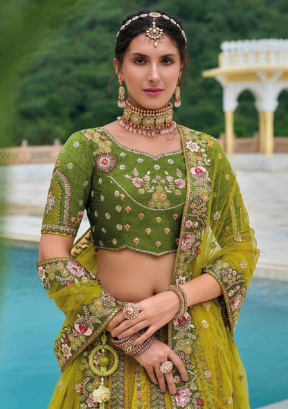 Lovely Yellow And Green Silk Bridal Lehenga With Embroidery Work