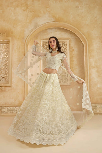 Chic Off White Net With Embroidery Work Gliterring Lehenga