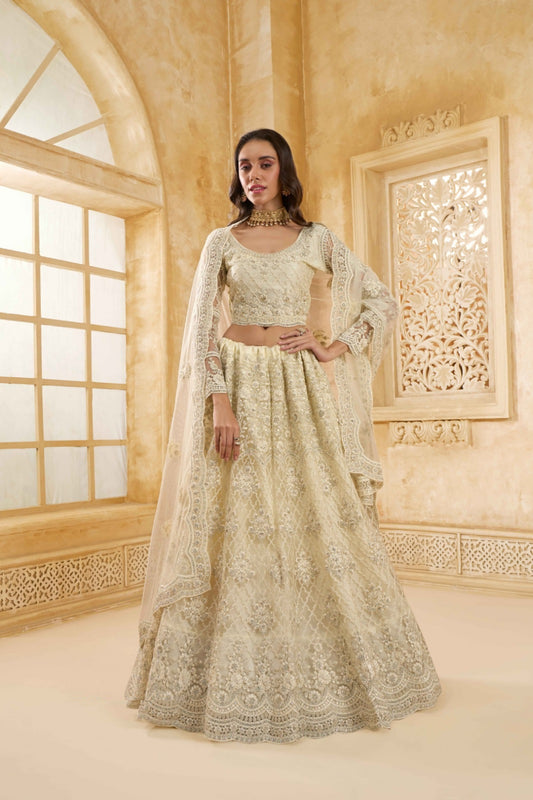Luxurious Off White Net With Embroidery Work Gliterring Lehenga