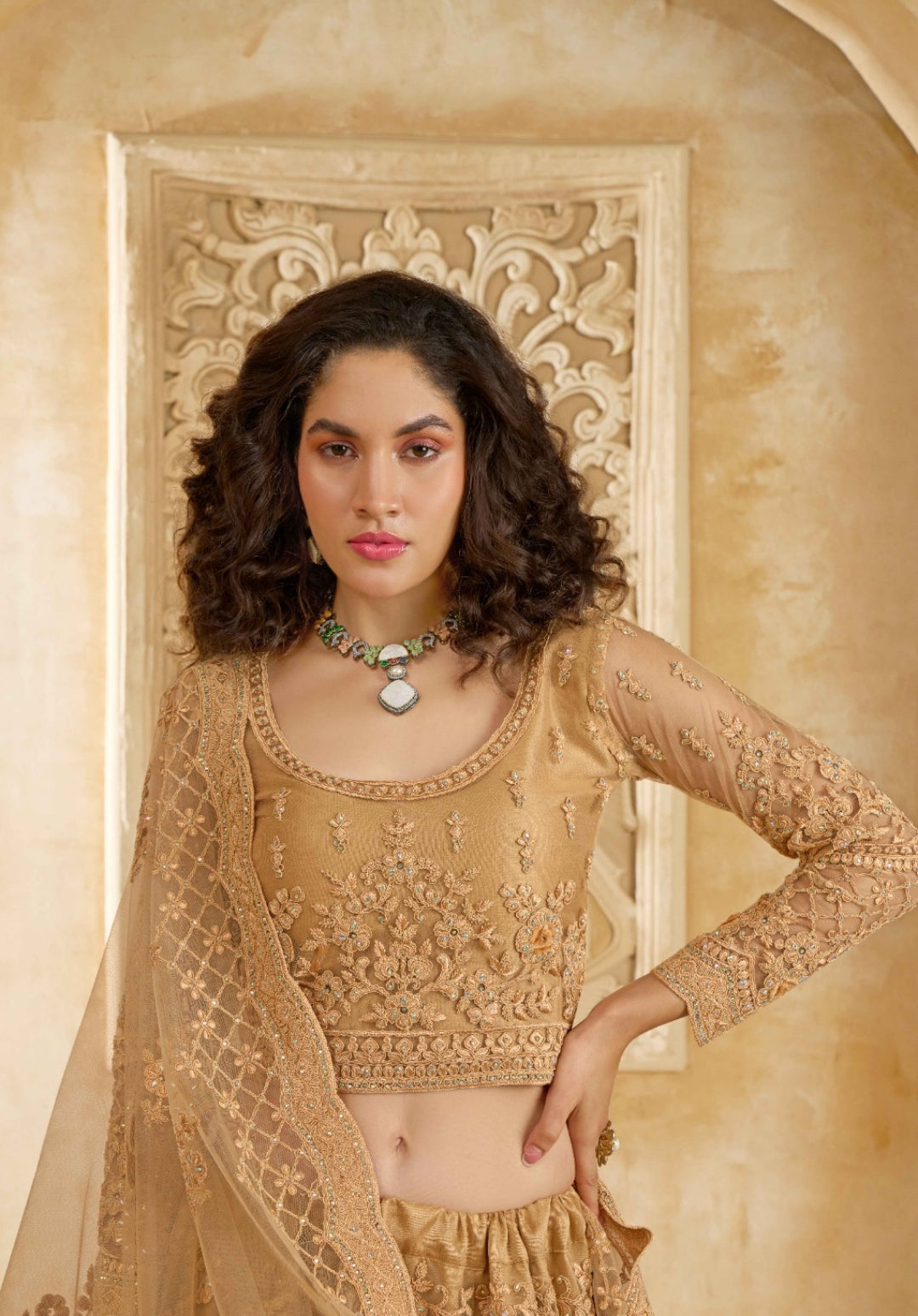 Graceful Beige Net With Embroidery Work Gliterring Lehenga
