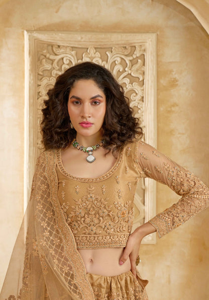 Graceful Beige Net With Embroidery Work Gliterring Lehenga