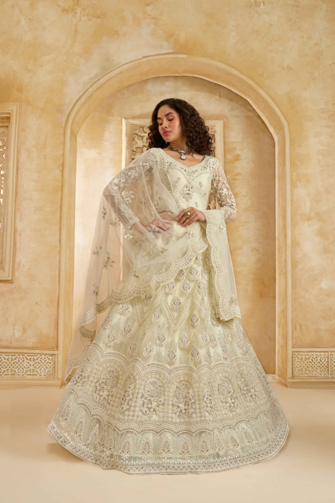 Trendy Off White Net With Embroidery Work Gliterring Lehenga