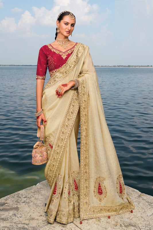Luxurious Beige And Maroon Pure Crape Jaquard Saree With Jari, Cut-Dana, Mirror & Jardoshi Heavy Work Boutique Style Saree