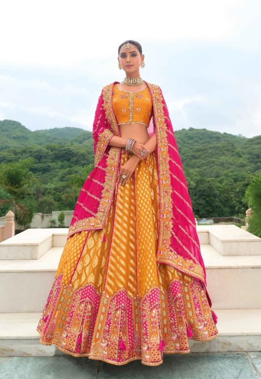 Designer Orange And Pink Silk Bridal Lehenga With Embroidery Work