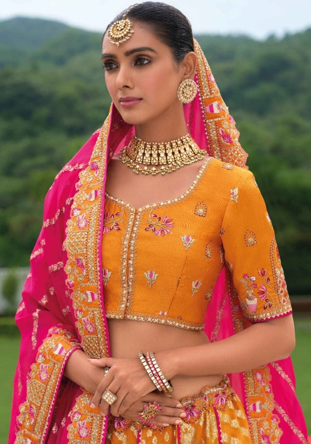 Designer Orange And Pink Silk Bridal Lehenga With Embroidery Work