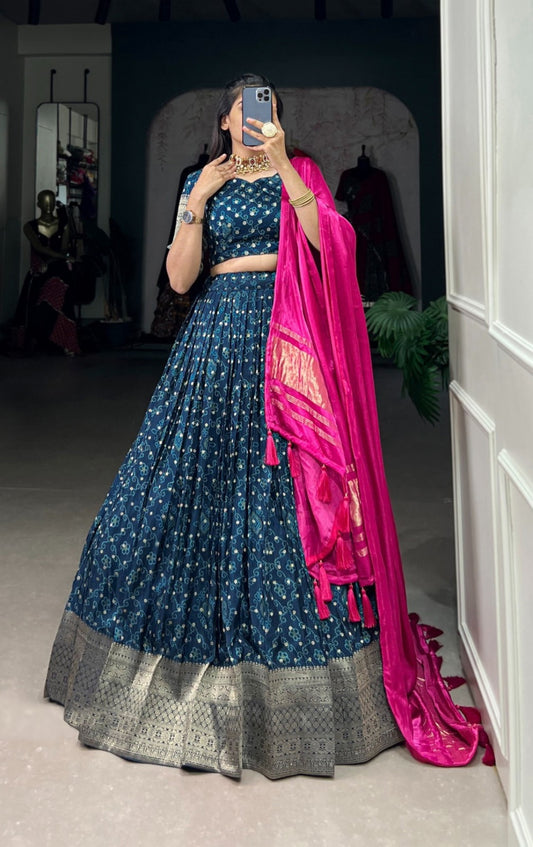 Enchanting Blue Viscose Dola Silk With Zari Weaving Printed Bandhani Lehenga