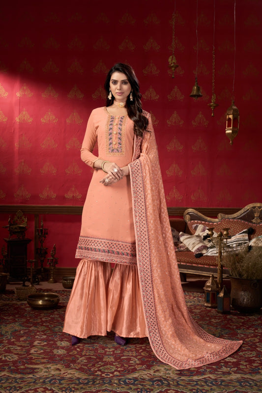 Flattering Peach Faux Georgette Gharara Bottom Suit Set