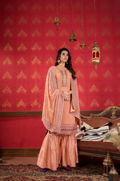 Flattering Peach Faux Georgette Gharara Bottom Suit Set
