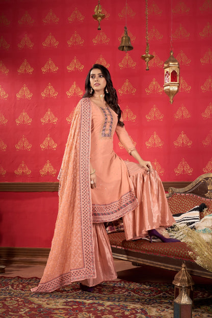 Flattering Peach Faux Georgette Gharara Bottom Suit Set