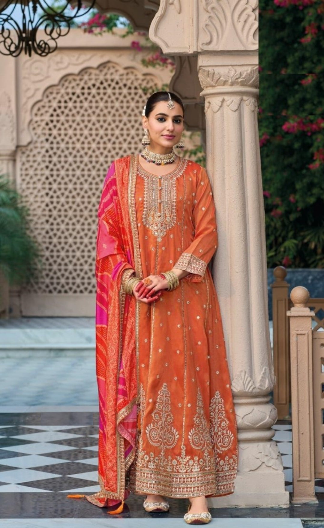 Immaculate Orange Heavy Shimmer Gown With Dupatta