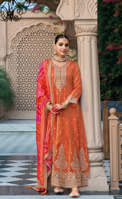 Immaculate Orange Heavy Shimmer Gown With Dupatta