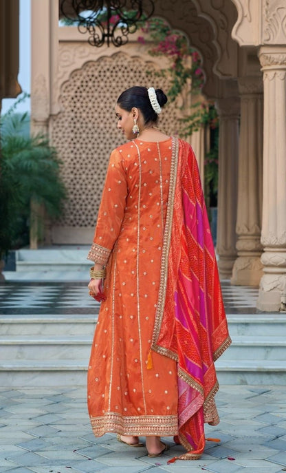 Immaculate Orange Heavy Shimmer Gown With Dupatta