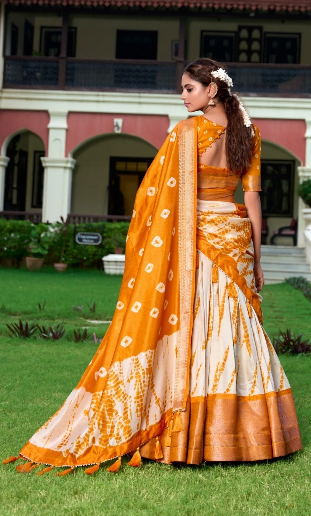 Vibrant Cream And Rust Dola Silk Shibori Print With Zari Weaving Border Traditional Lehenga